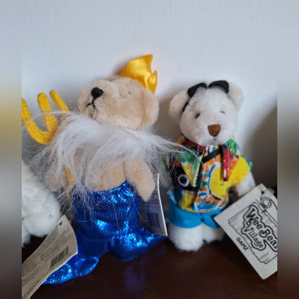 Collectible teddy bears from the Ganz brand, specifically from the Wee Bear Vill